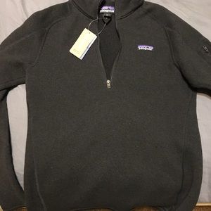 Patagonia Black 1/4 zip sweater.